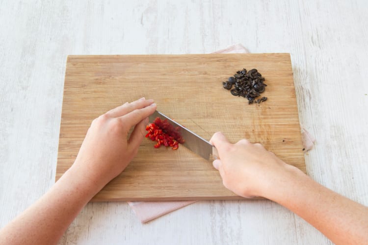 Chop you olives and chilli