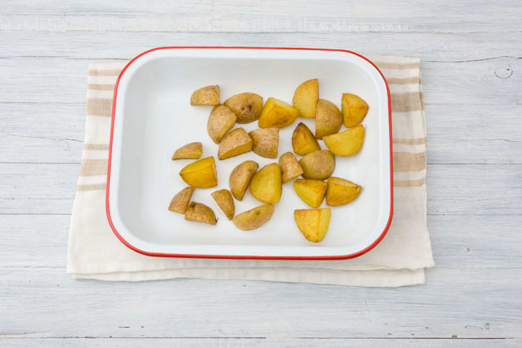 Place the potatoes onto the oven tray