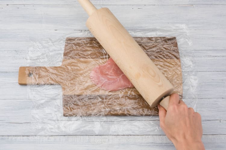 Bash Pork with a rolling pin