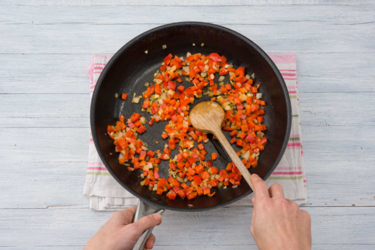 Cook the onion and capsicum until soft