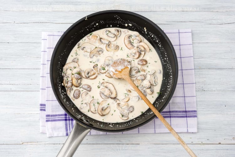 Add your water and ricotta to the mushrooms