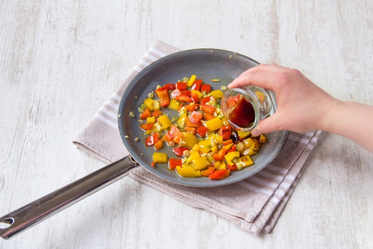 Add the sauce to the pepper chunks