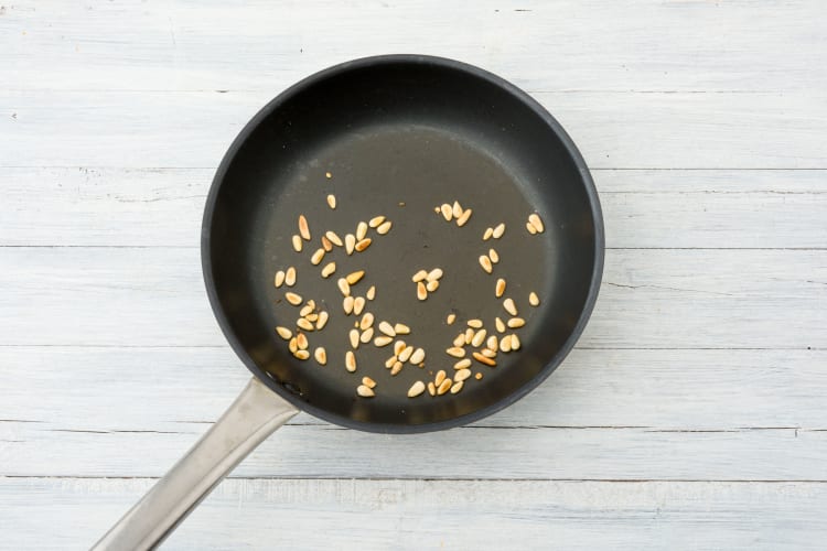 Toast the pine nuts