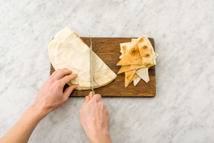 Cut the Lebanese bread into triangles