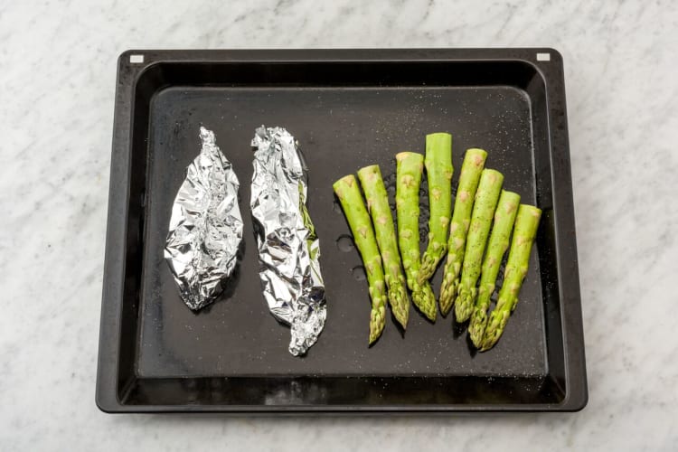 Cook the salmon and asparagus