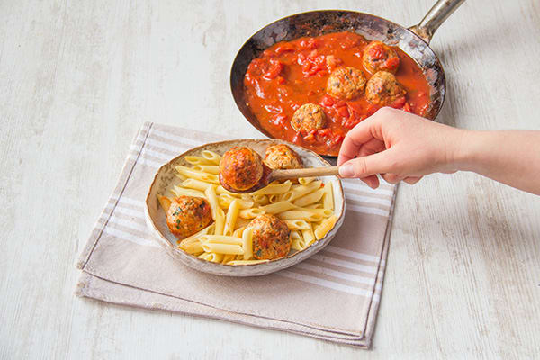 Divide the pasta between bowls and top meatballs, sauce and Parmesan cheese