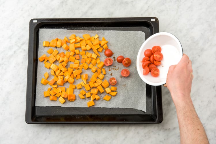 Cook the pumpkin and cherry tomatoes