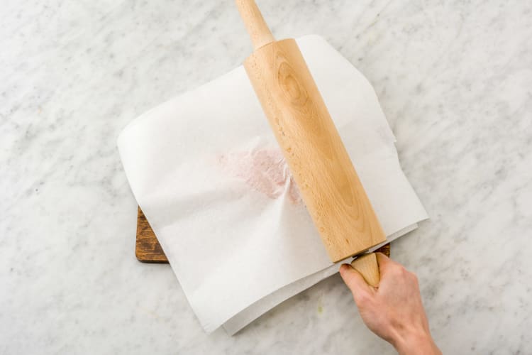 Flatten chicken with a rolling pin