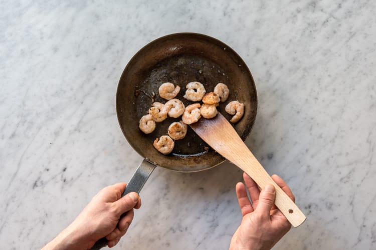 Cook the prawns and garlic