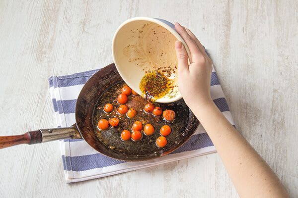 Warm the vinaigrette and tomatoes