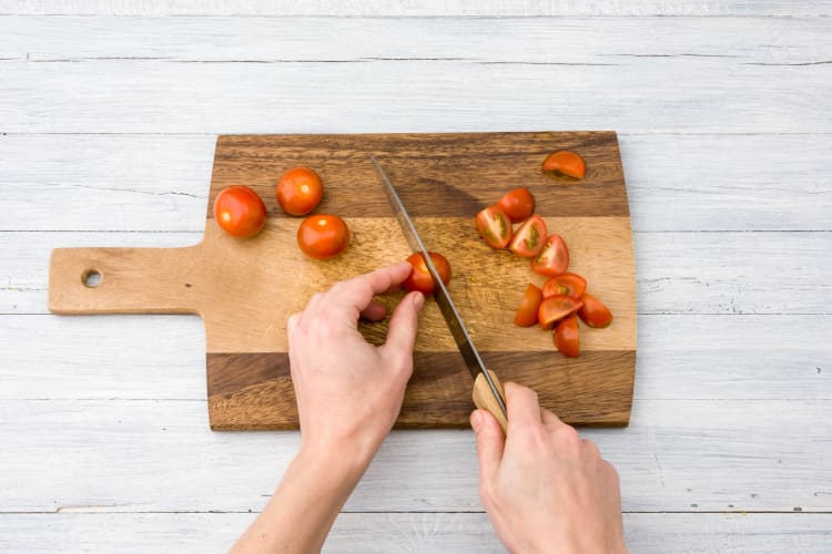 Halve the tomatoes