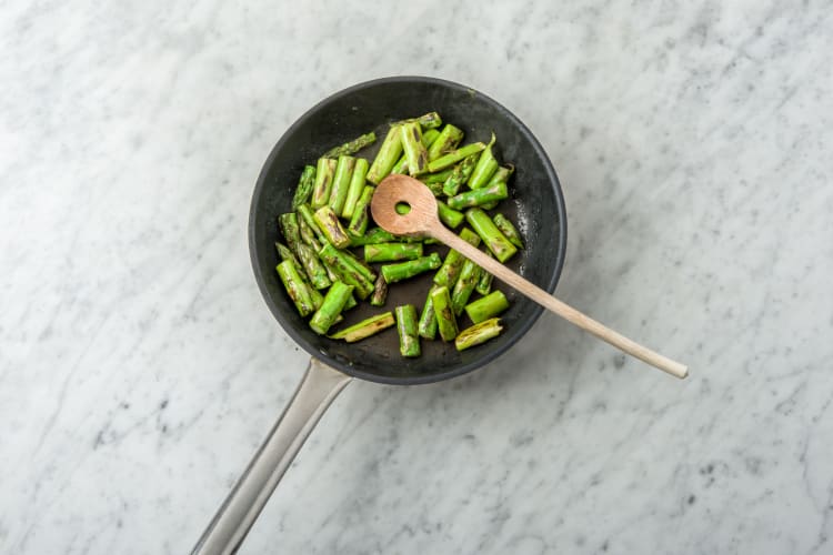Stir fry the asparagus