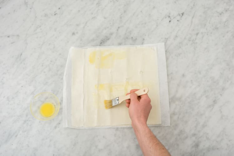 Brush each sheet of filo pastry