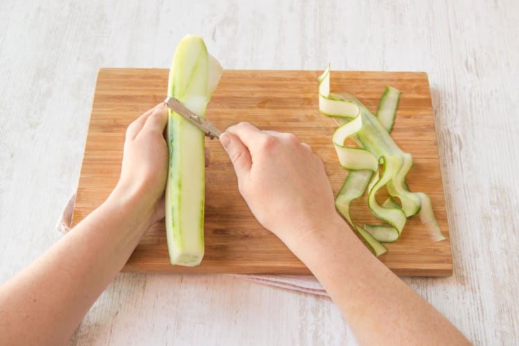 Peel the cucumber into ribbons
