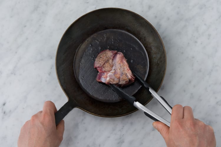 Sear the lamb on each side