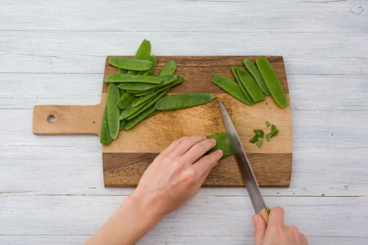 Trim the snap peas