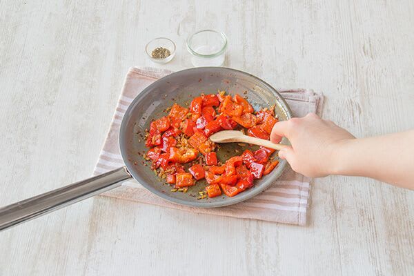 Cook the peppers and onions