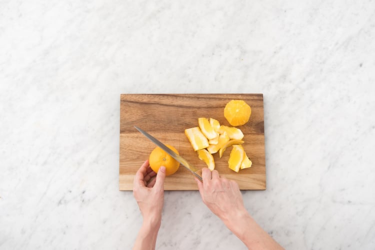 Prep ingredients and supreme the orange