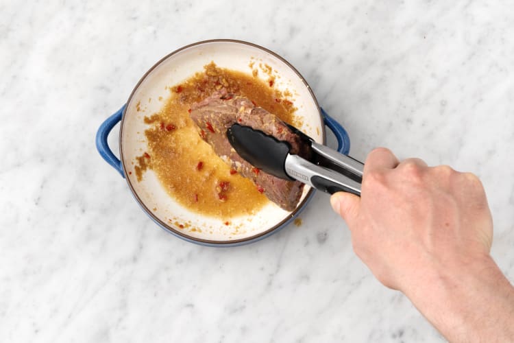 Remove the steak from the marinade
