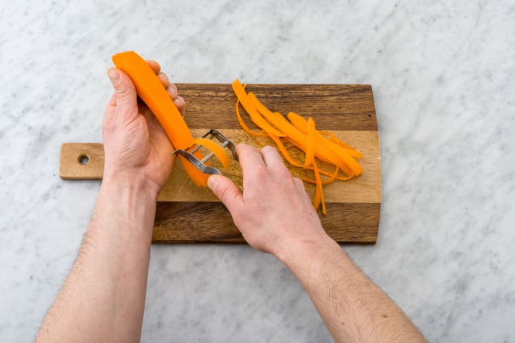 Peel the carrots into ribbons