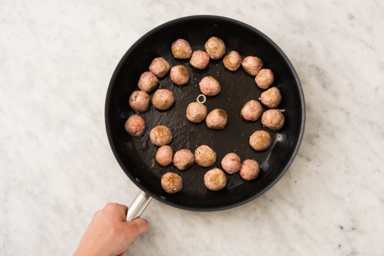 Cook Carrots and Brown Meatballs