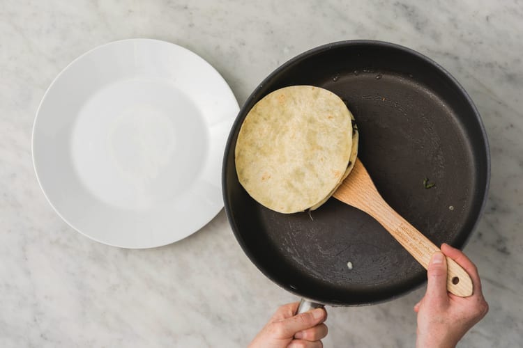 Flip the quesadillas