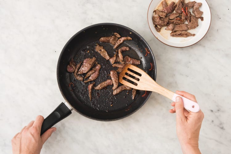 Cook the beef strips