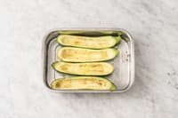 Courgettes halveren