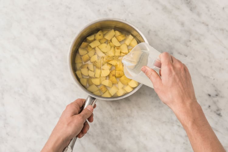 Cook potatoes and start prep