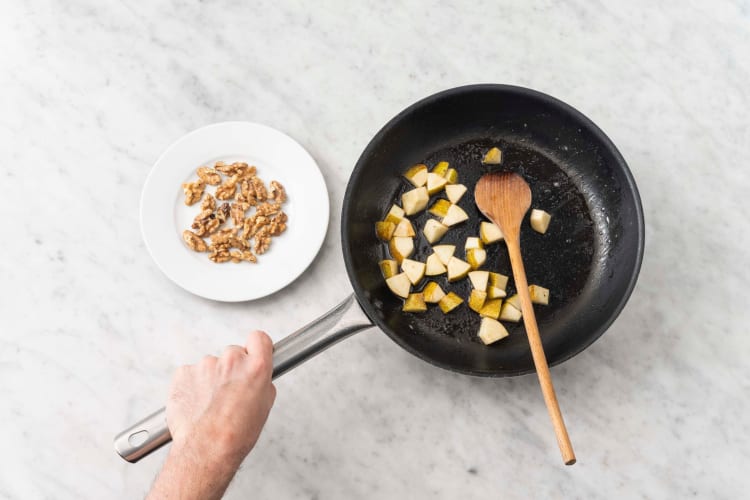 Toast walnuts and cook pears