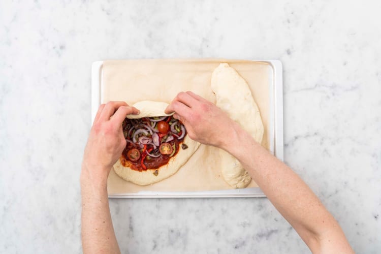 Garnir la pizza