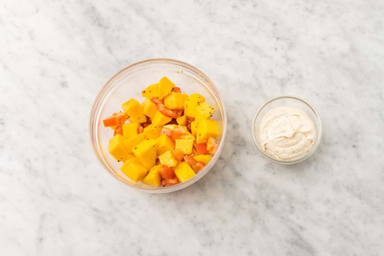 Mix sour cream and marinate mango