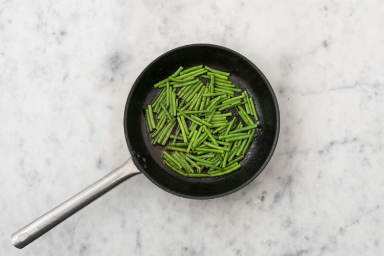 Cook garlicky green beans