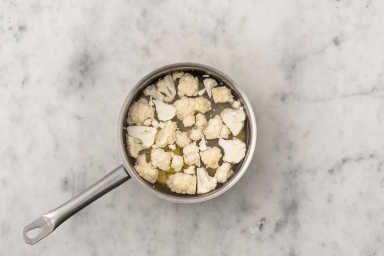 Cook potatoes and cauliflower