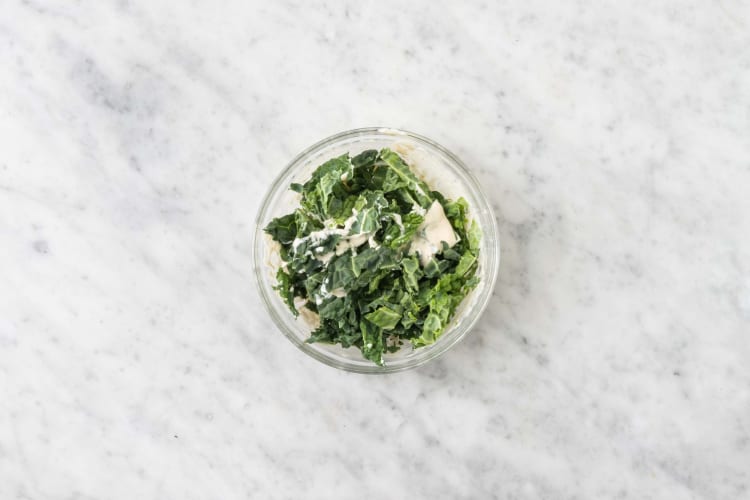 Assemble kale Caesar salad