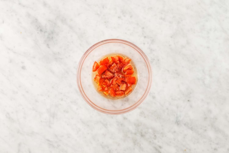 Marinate tomatoes and caramelize onions