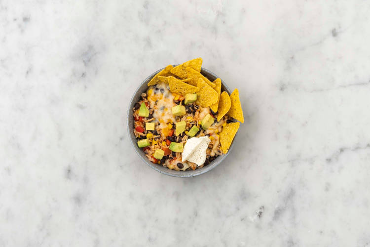 Cheesy EnchiladaReis mit schwarzen Bohnen Rezept HelloFresh