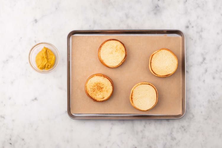 Make peanut butter-curry mayo and prep buns