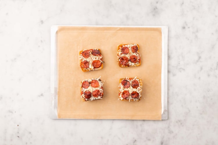 Assemble and bake pizza toasts
