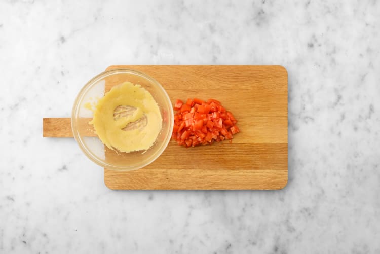 Prep tomatoes and make dressing