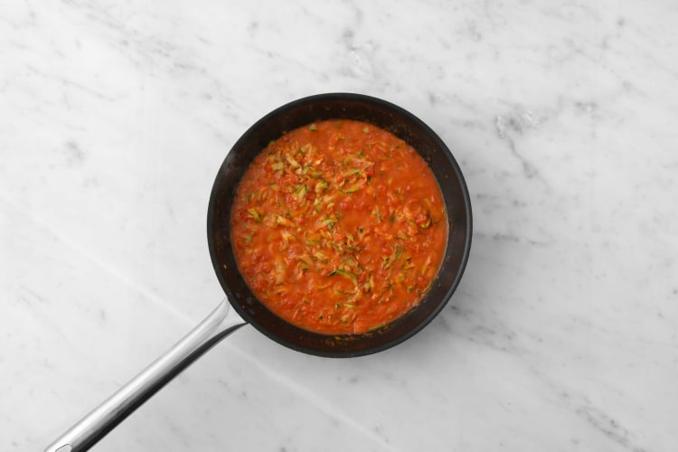 Prep and start tomato sauce