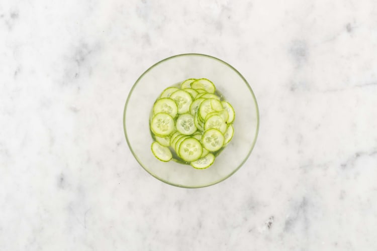 Prep and marinate cucumbers