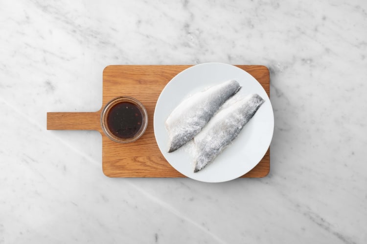 Make stir-fry sauce and prep sea bass