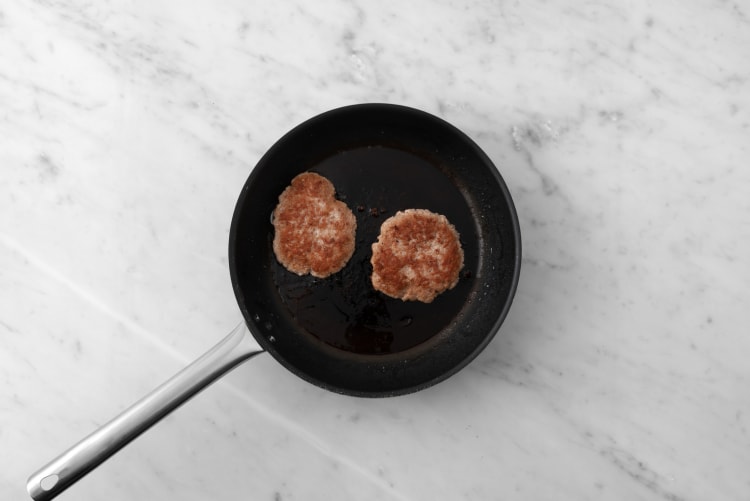 Cuire l'escalope de poulet panée