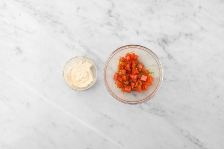 Make spiced sour cream and marinate tomatoes