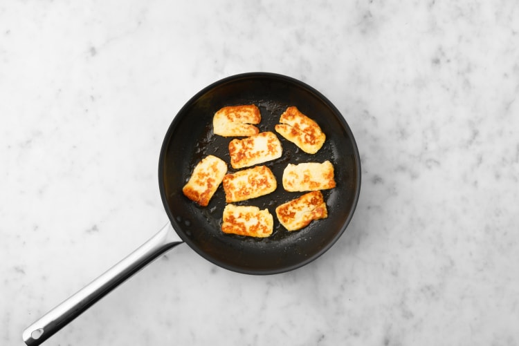 Cook halloumi and almonds