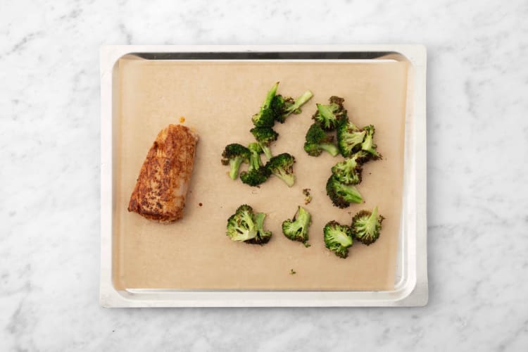 Cook pork and broccoli