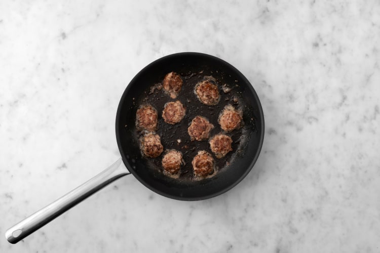 Sear meatballs