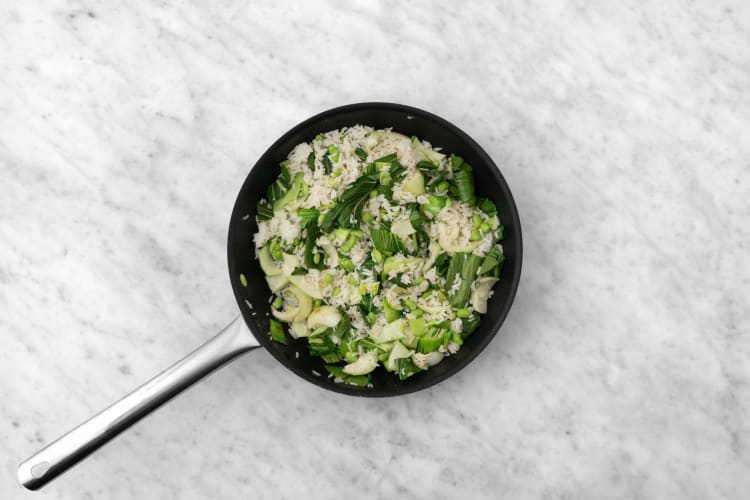 Cook veggies and finish rice