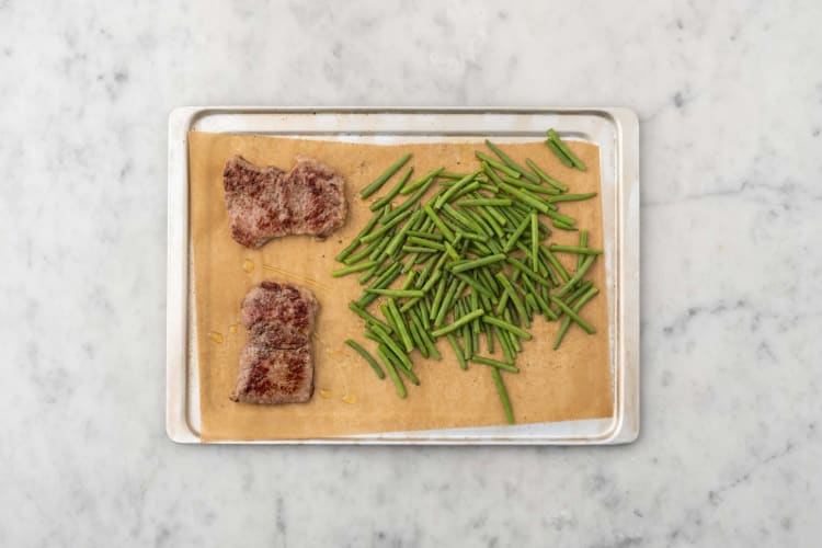 Roast steaks and green beans